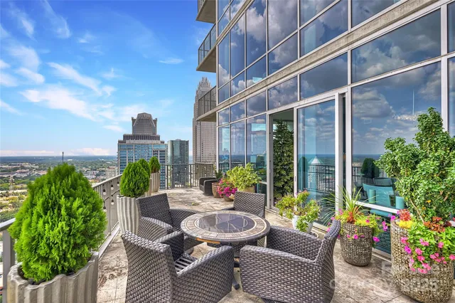 a building outdoor space with patio furniture