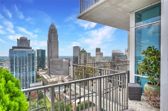 a view of a balcony with city view