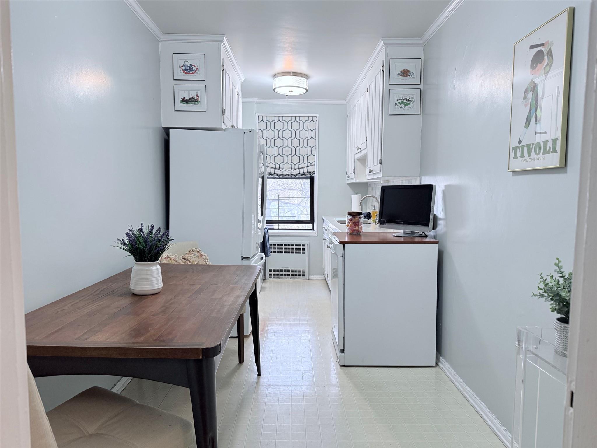 83-15 98th Street, Unit 3C Queens, NY 11421 - Photo 5 of 12 a view of a dining room with furniture