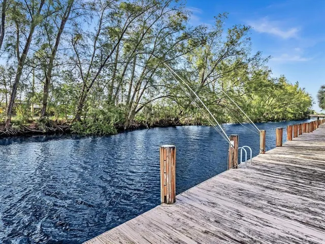 a view of a backyard of the house