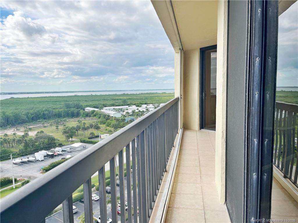 9500 South Ocean Drive, Unit 1410 Jensen Beach, FL 34957 - Photo 14 of 17 a balcony with an outdoor view