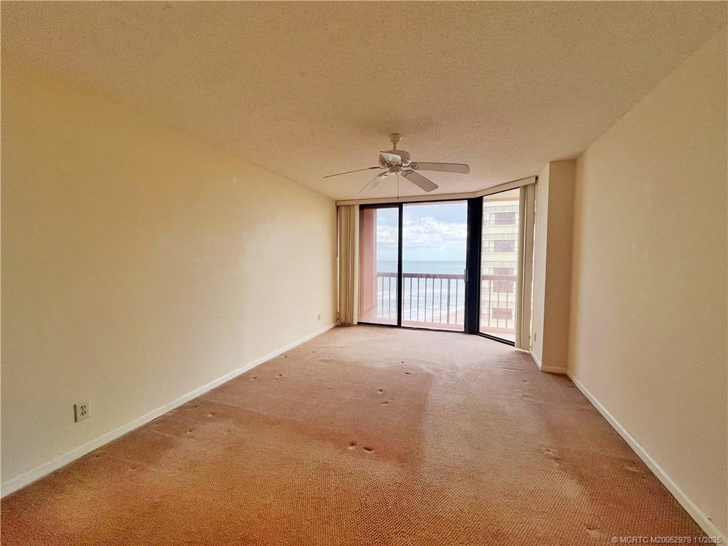9500 South Ocean Drive, Unit 1410 Jensen Beach, FL 34957 - Photo 6 of 17 a view of an empty room with a window