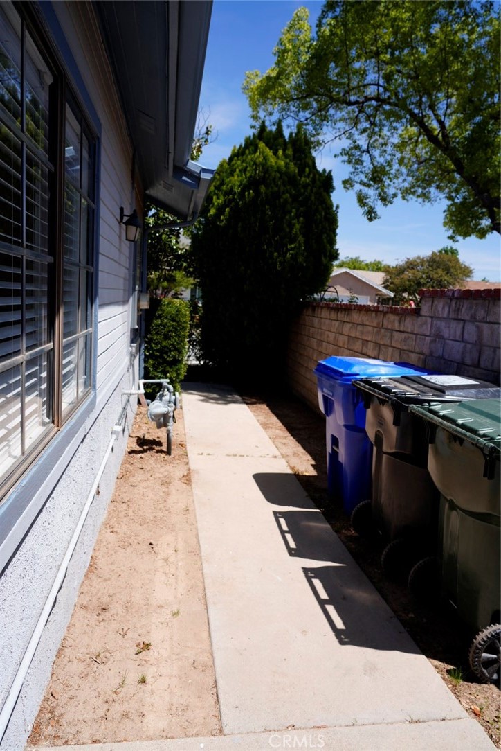 28015 Tupelo Ridge Drive Valencia, CA 91354 - Photo 41 of 41 Side yard along garage, located in front of backyard gate