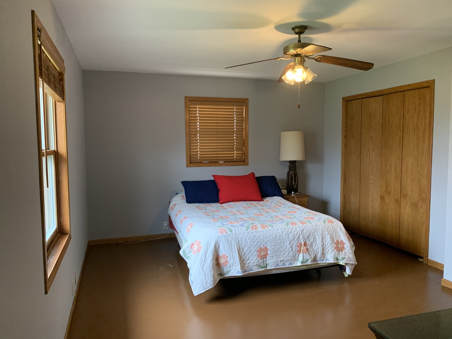 9245 West 2000 S Road Bonfield, IL 60913 - Photo 8 of 27 a bedroom with a bed and a chandelier