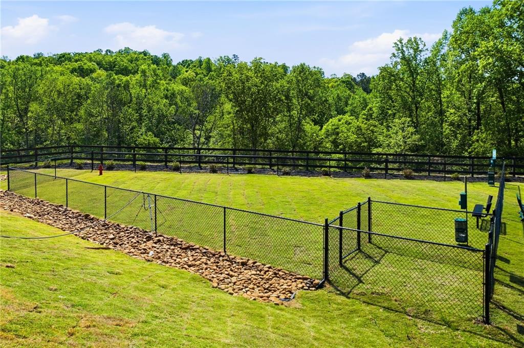 299 Summit View Lane, Unit 5 Jasper, GA 30143 - Photo 35 of 43 a view of a swimming pool with a yard