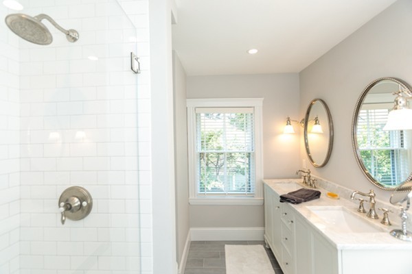 6 Solon Street Wellesley, MA 02482 - Photo 16 of 25 a bathroom with a sink and a mirror
