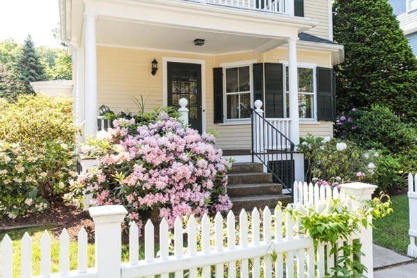 6 Solon Street Wellesley, MA 02482 - Photo 23 of 25 a front view of a house with a garden