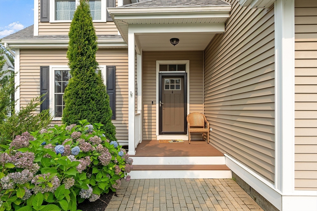 46 Jordan Road Holden, MA 01520 - Photo 39 of 42 a view of a house with potted plants