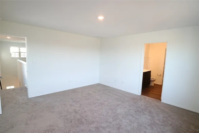 an empty room with an entryway