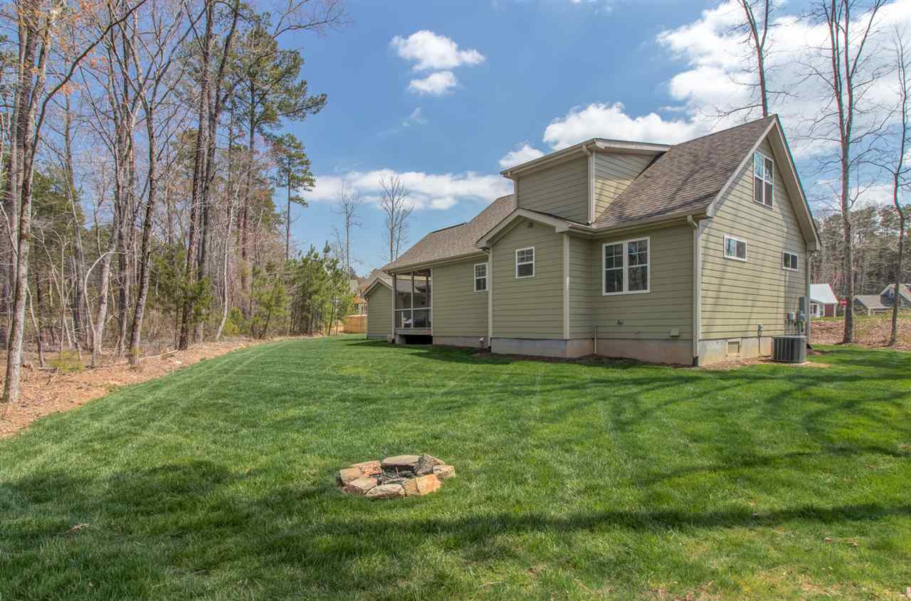 4 Moss Spring Court Durham, NC 27712 - Photo 25 of 25 Beautiful lush lawn - neighborhood is adjacent to a 20-acre woodland preserve Lawn