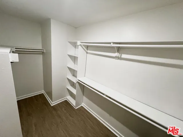 a view of an empty walk in closet