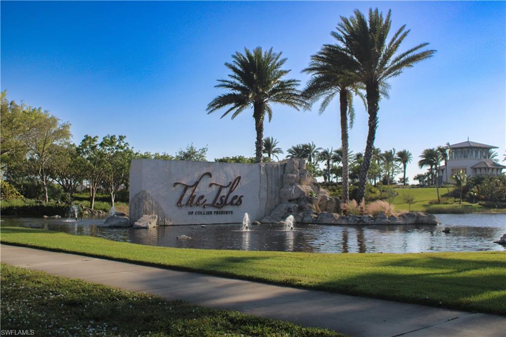 5685 Highbourne Drive Naples, FL 34113 - Photo 1 of 26 a view of swimming pool and lake view