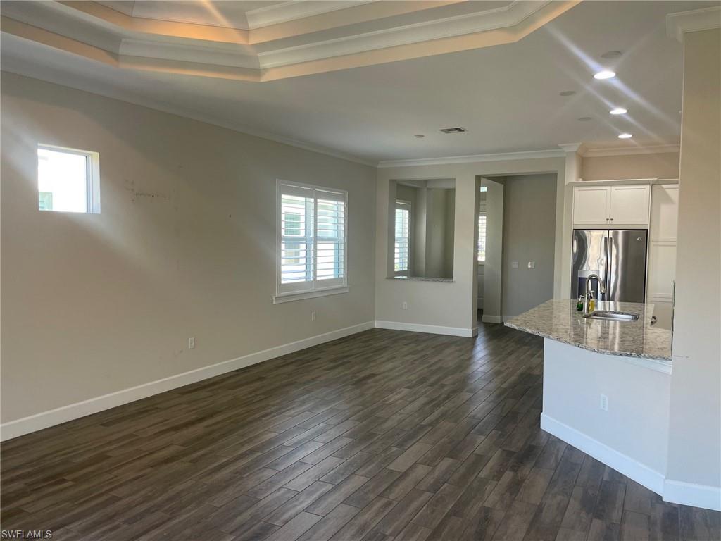 5685 Highbourne Drive Naples, FL 34113 - Photo 20 of 26 a view of an empty room and window