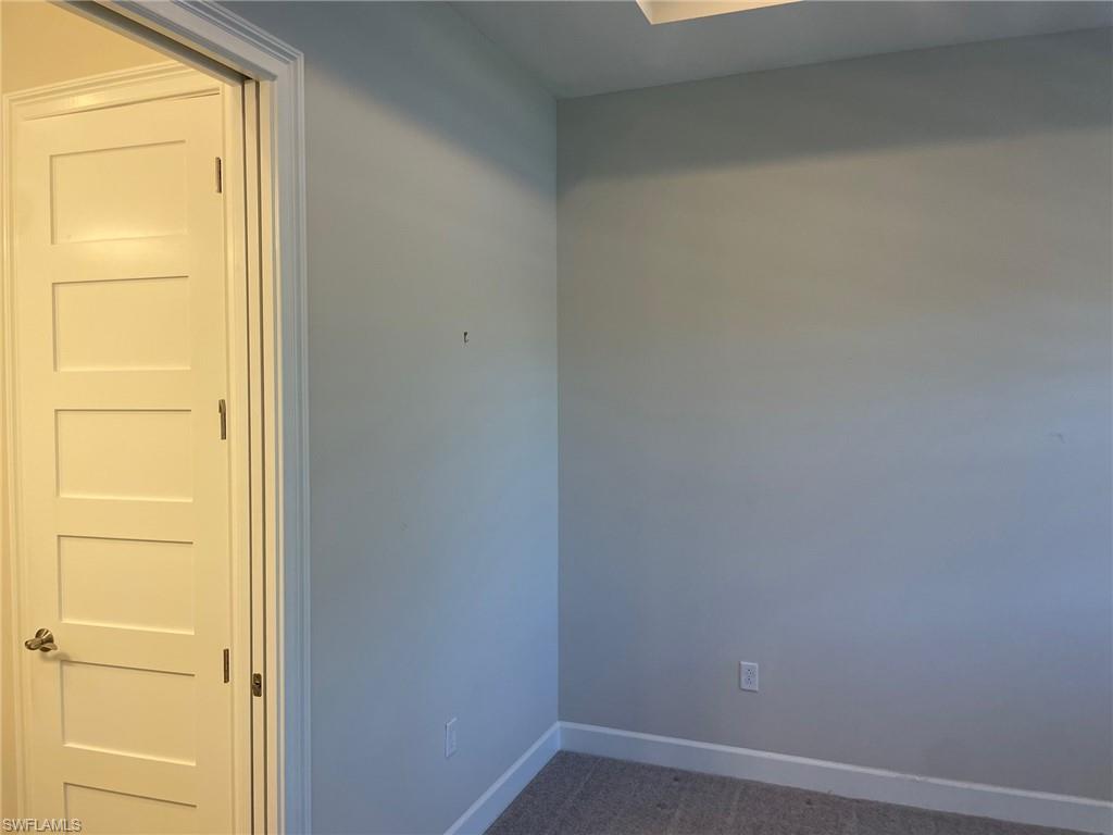 5685 Highbourne Drive Naples, FL 34113 - Photo 22 of 26 a small space with a window