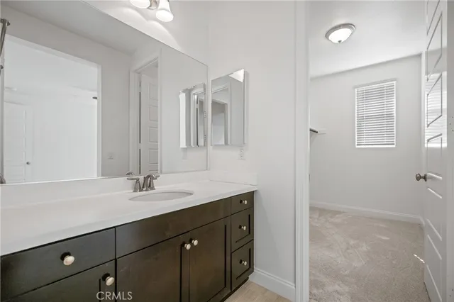 a view of a house with pool table and chairs