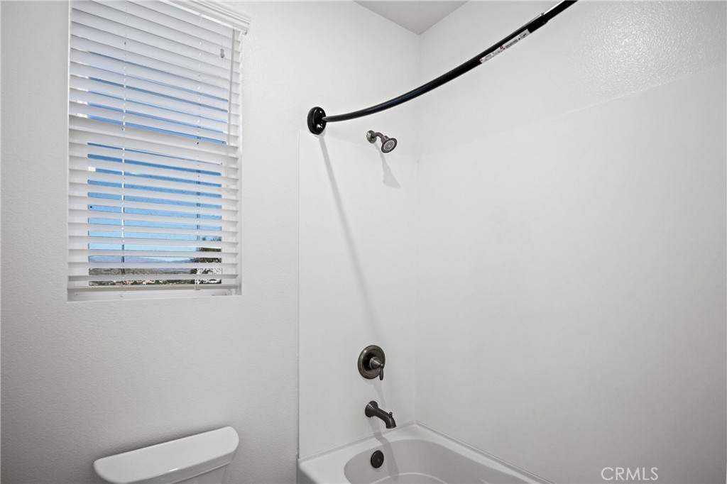 24910 Old Stone Way Stevenson Ranch, CA 91381 - Photo 46 of 67 a bathroom with a shower