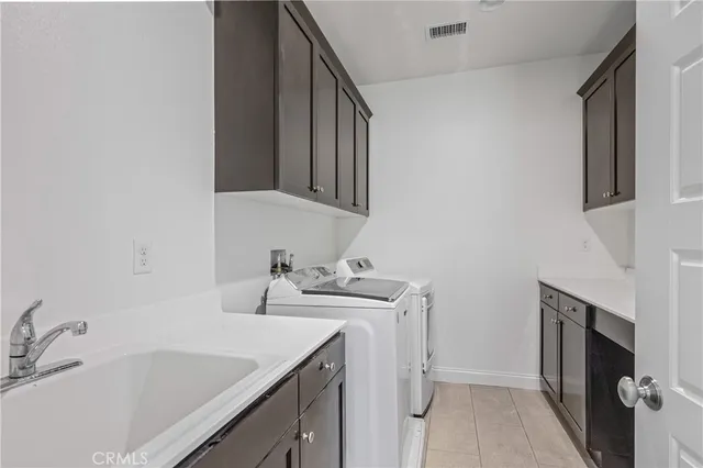 a view of a house with swimming pool yard and outdoor seating