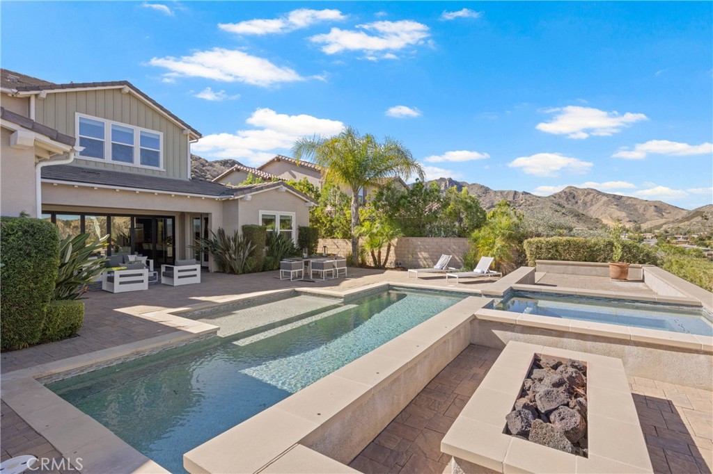 24910 Old Stone Way Stevenson Ranch, CA 91381 - Photo 57 of 67 a view of a house with pool table and chairs