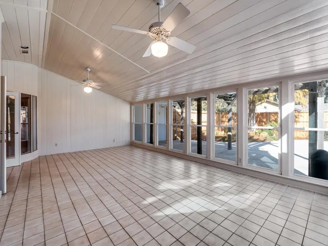 a view of a kitchen cabinets and wooden floor