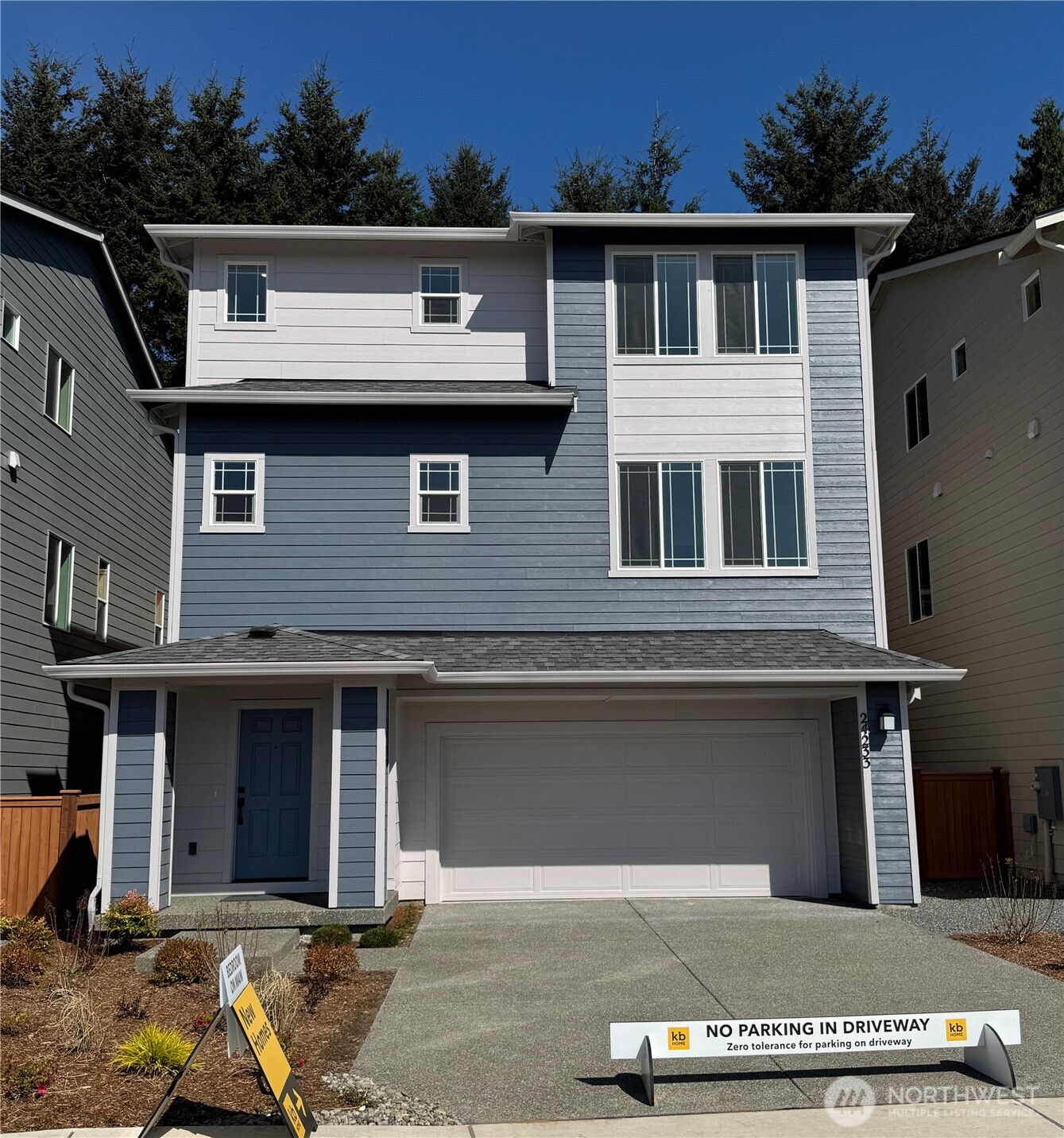 24233 13 Avenue Southeast, Unit CR26 Bothell, WA 98021 - Photo 1 of 21 a front view of a house with a yard