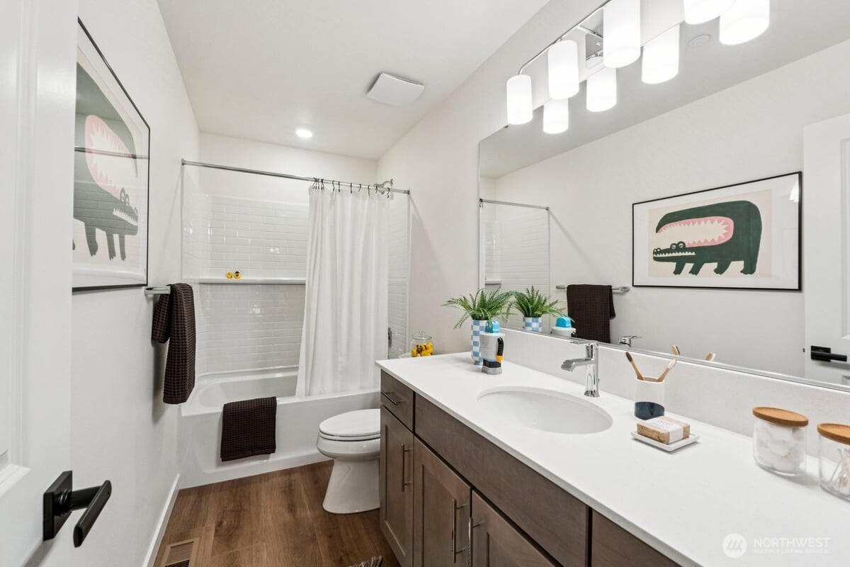 24233 13 Avenue Southeast, Unit CR26 Bothell, WA 98021 - Photo 17 of 21 a bathroom with a sink toilet and shower