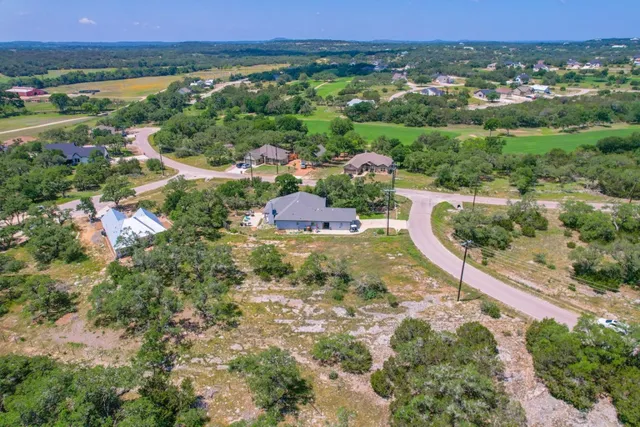 a view of a city with an ocean