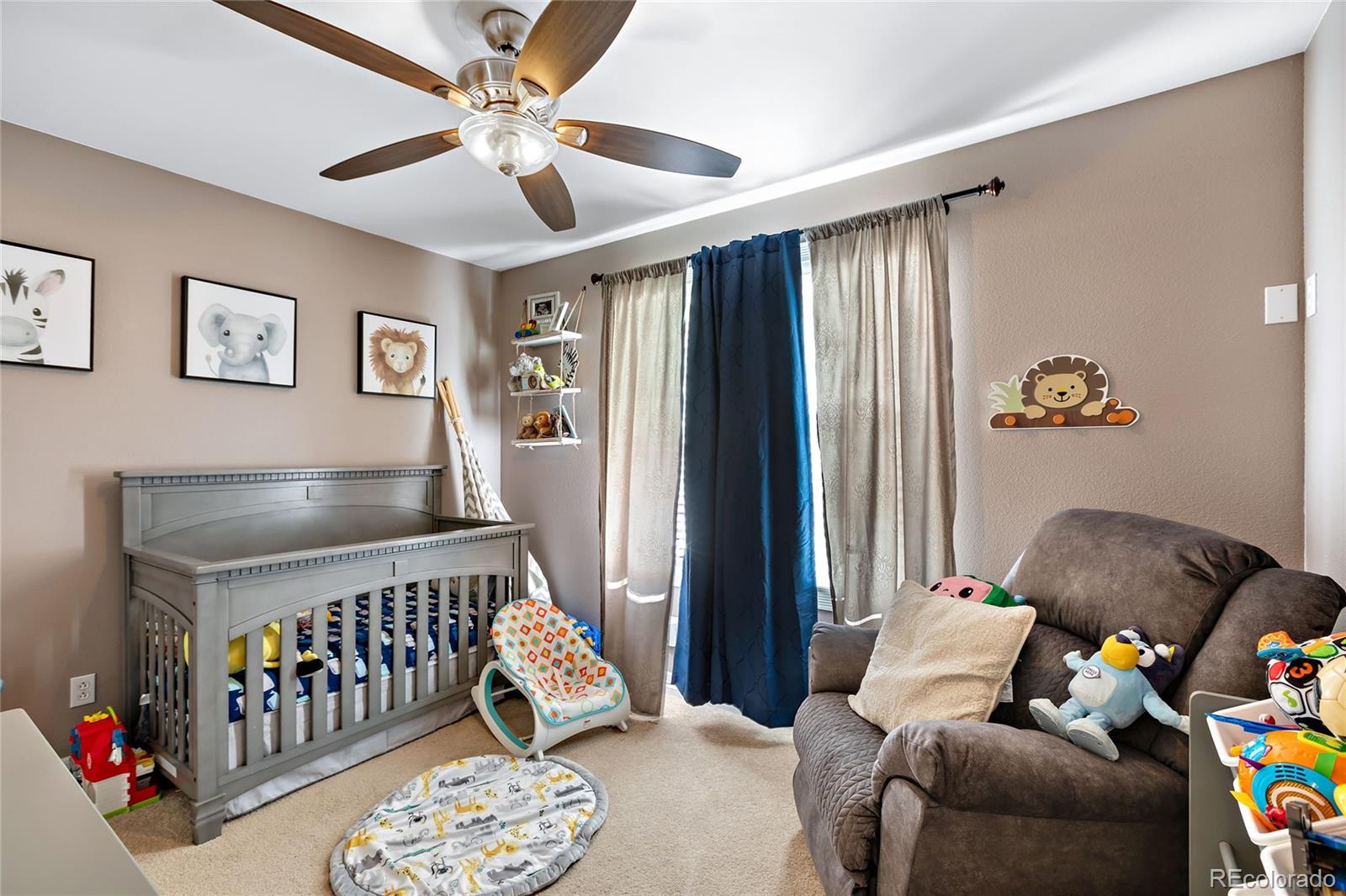 5546 Drake Street Frederick, CO 80504 - Photo 12 of 25 a bedroom with furniture and a window