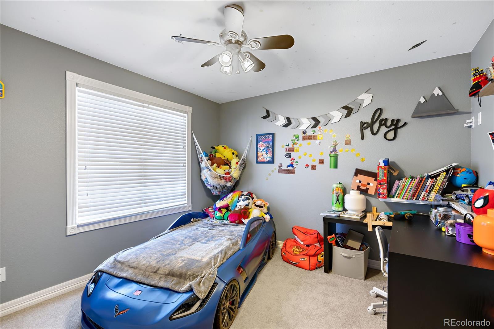 5546 Drake Street Frederick, CO 80504 - Photo 10 of 25 a bedroom with a bed and a window