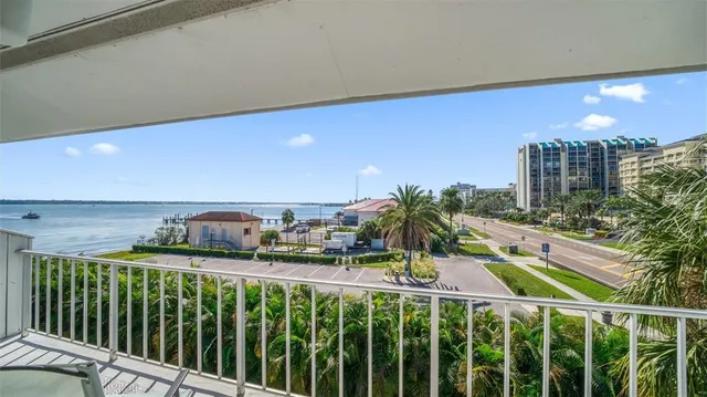 a view of a balcony with city view