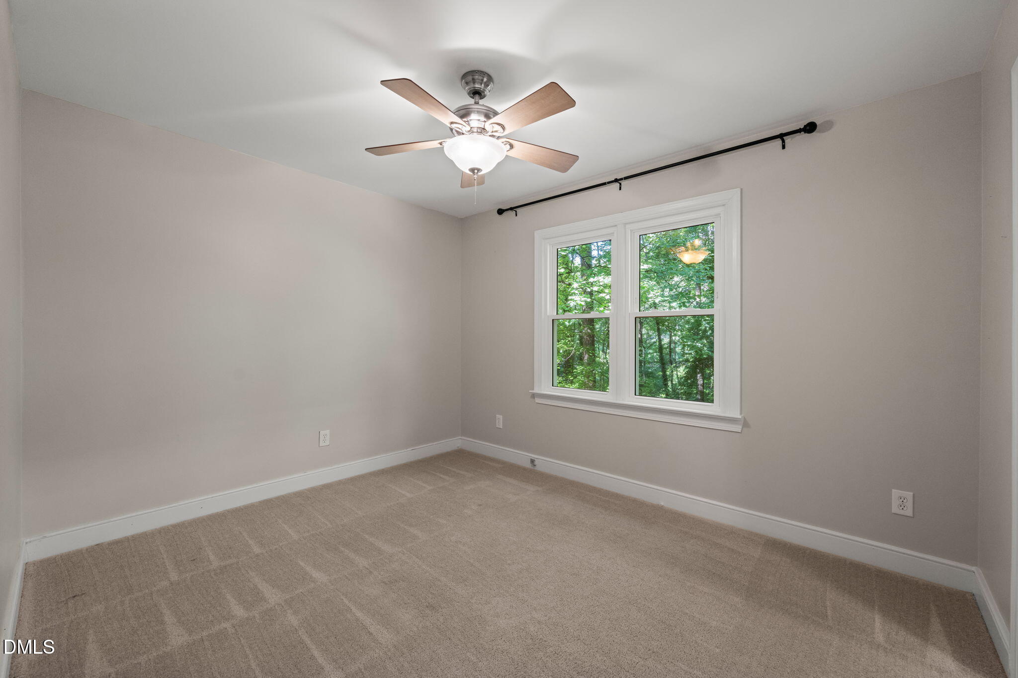 18 Strawberry Ridge Lane Durham, NC 27713 - Photo 38 of 59 an empty room with windows and fan