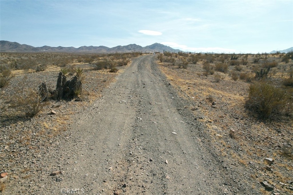 2 South Pipeline Road Oro Grande, CA 92368 - Photo 13 of 15 a view of a lake with mountains in the background