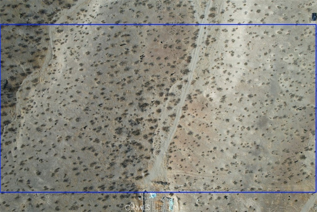 2 South Pipeline Road Oro Grande, CA 92368 - Photo 5 of 15 a bathroom with a shower curtain