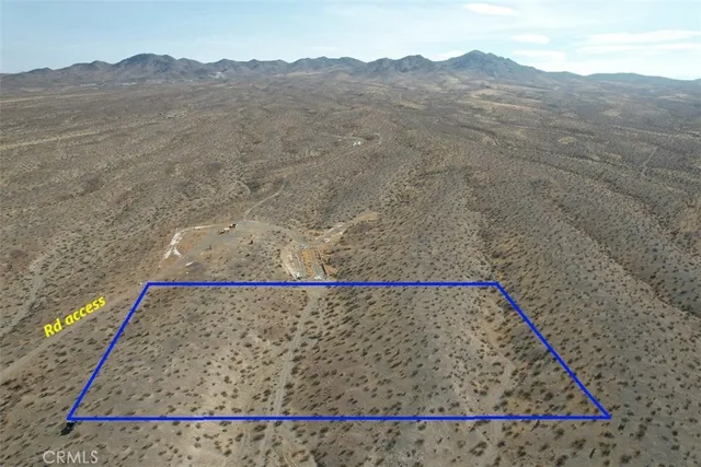a view of a lake with mountains in the background