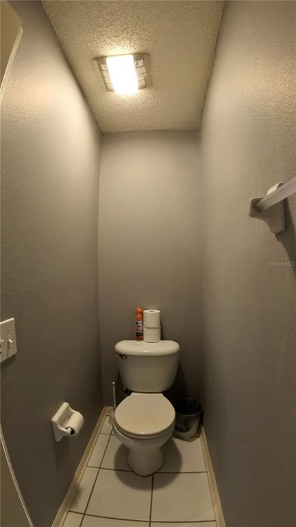 12633 Early Run Lane Riverview, FL 33578 - Photo 11 of 44 a bathroom with a toilet