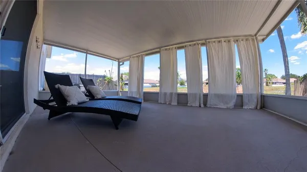 a view of swimming pool from a balcony