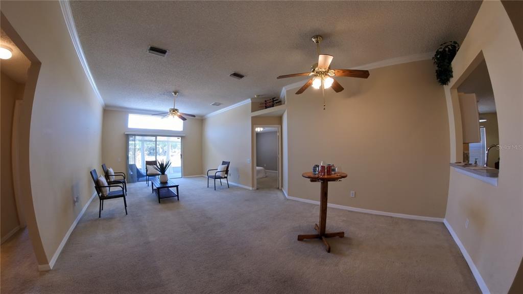 12633 Early Run Lane Riverview, FL 33578 - Photo 6 of 44 a view of a room with gym equipment