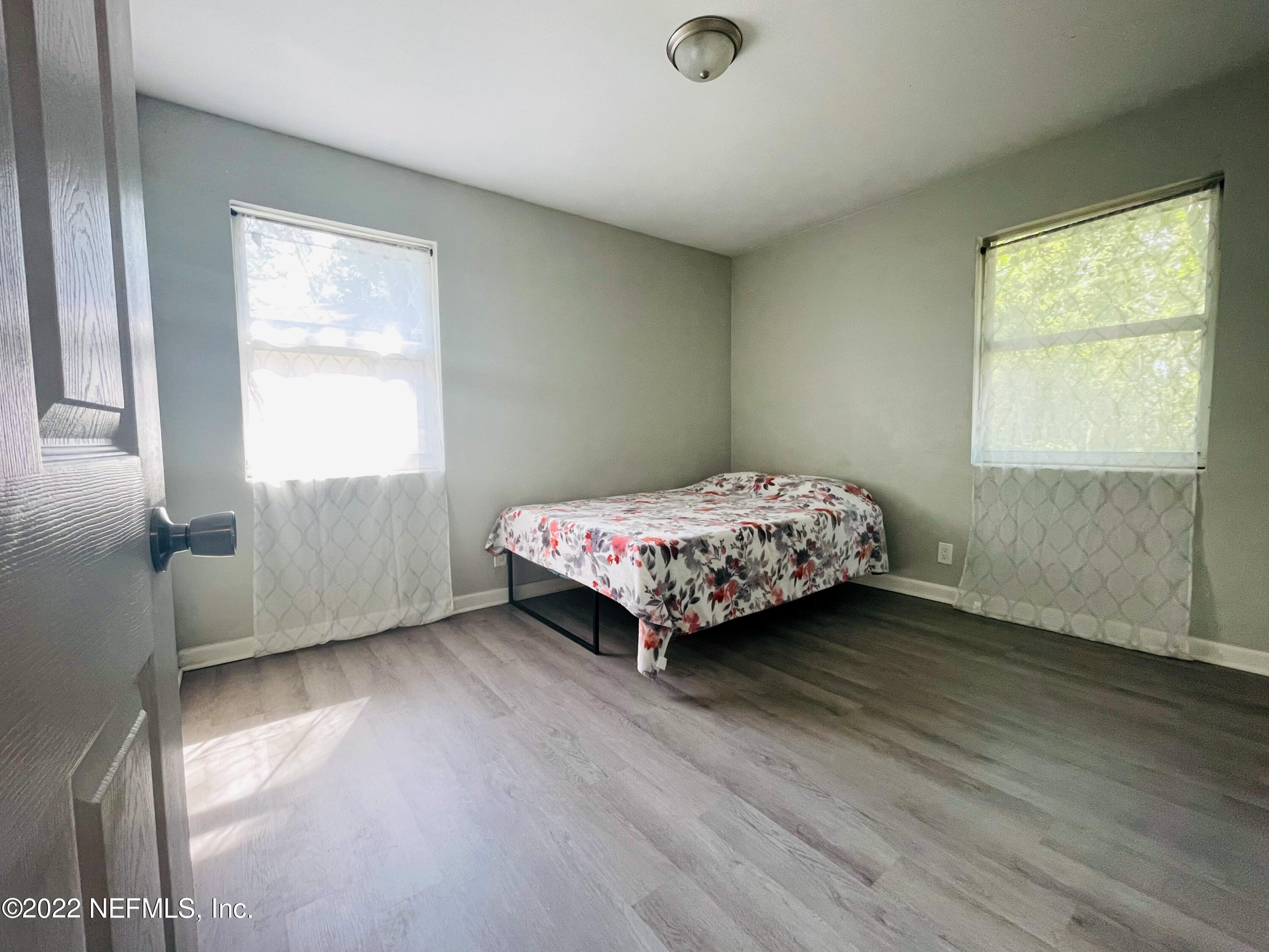 3151 Brasque Drive Jacksonville, FL 32209 - Photo 12 of 18 a bedroom with a bed and a window