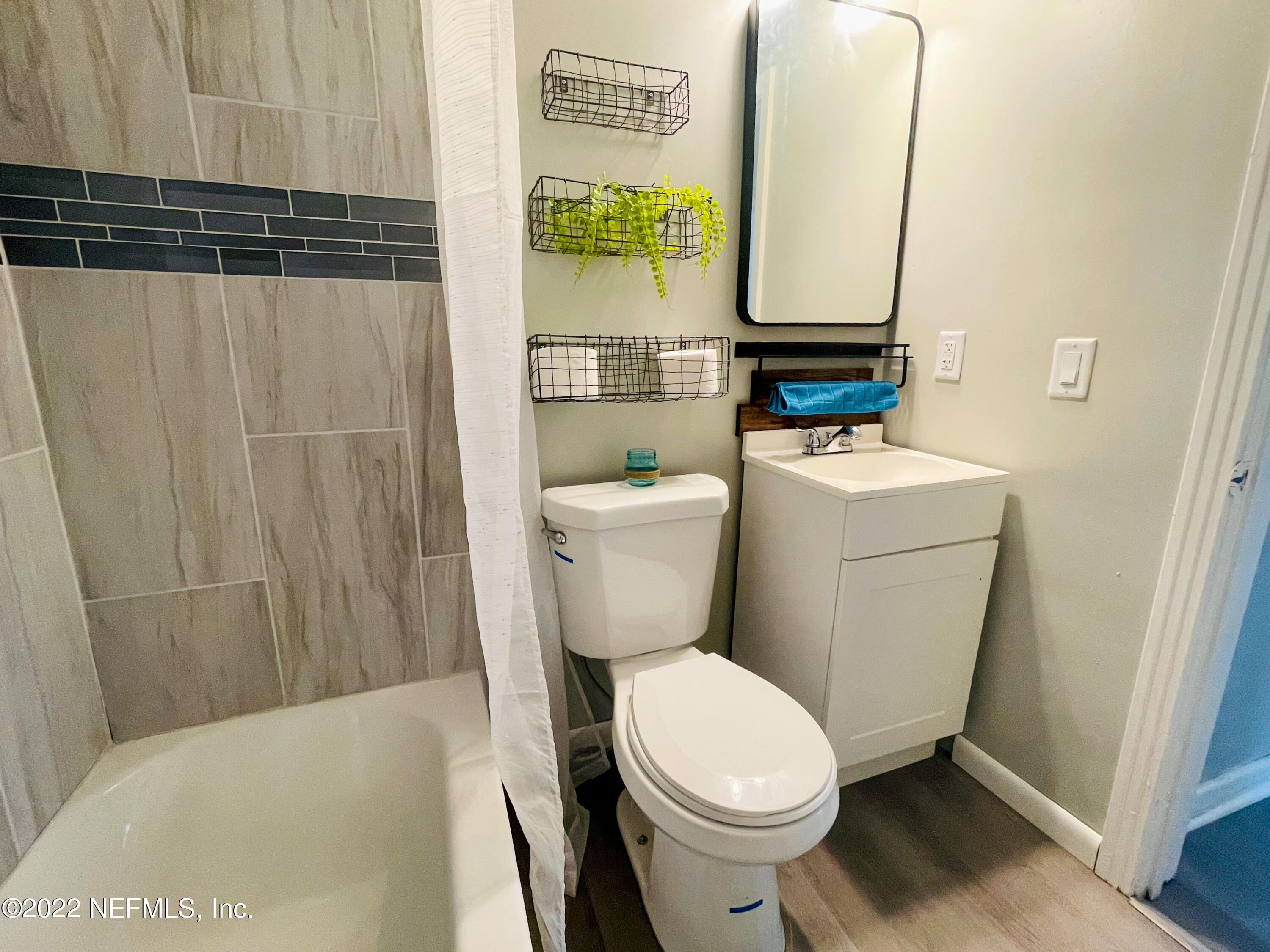 3151 Brasque Drive Jacksonville, FL 32209 - Photo 14 of 18 a bathroom with a sink and toilet