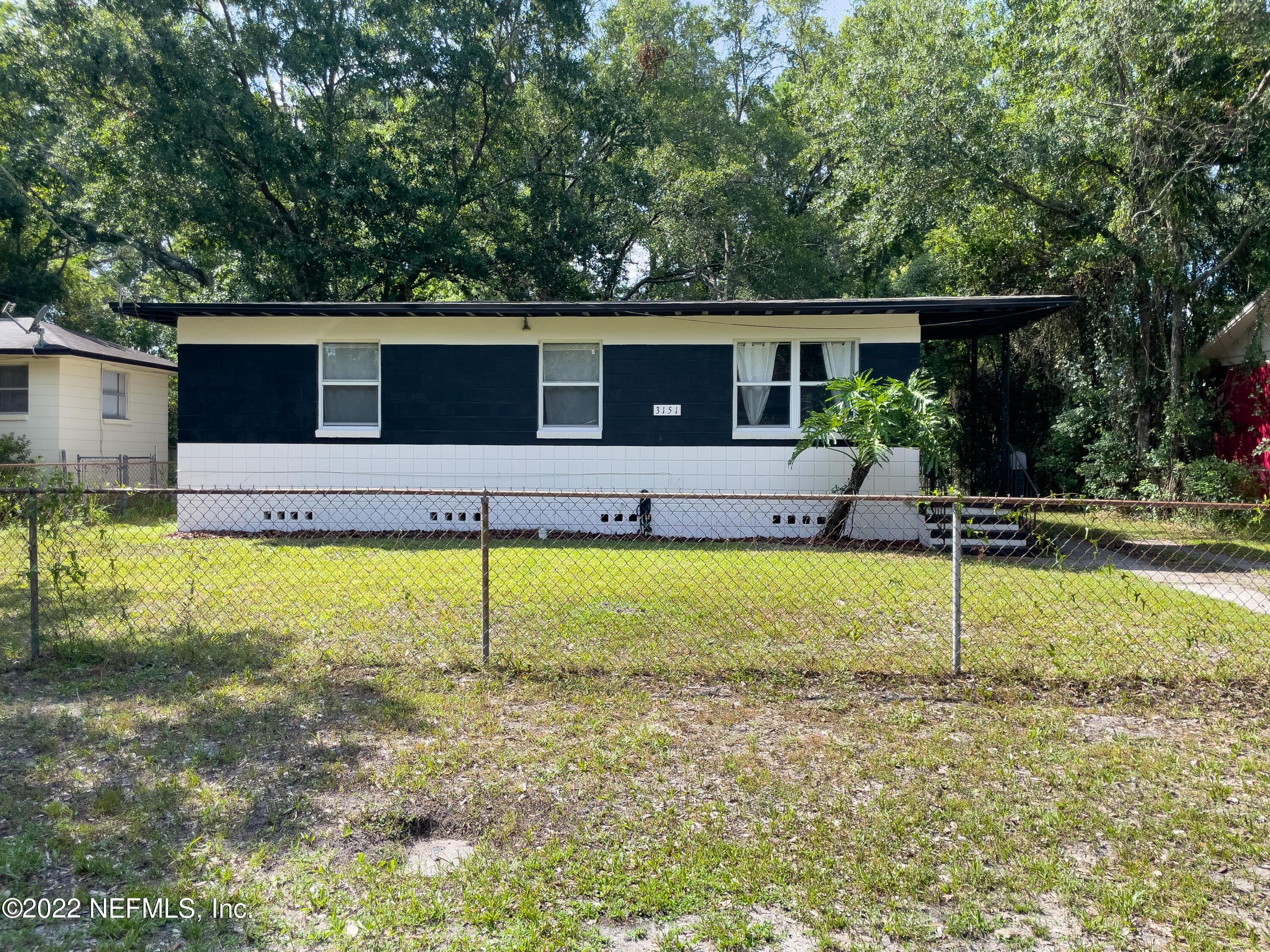 3151 Brasque Drive Jacksonville, FL 32209 - Photo 2 of 18 a view of house with swimming pool