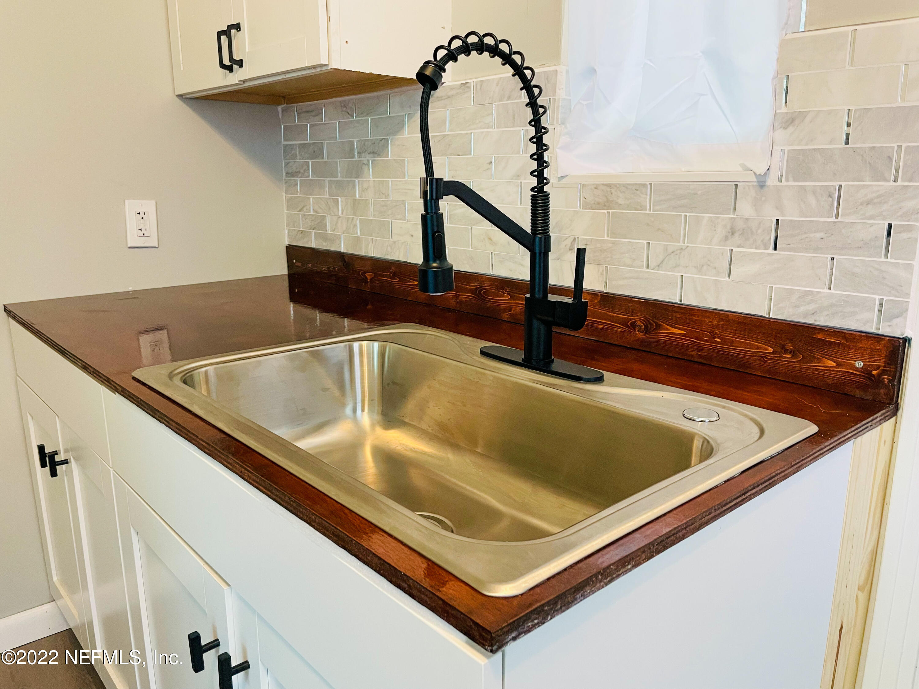 3151 Brasque Drive Jacksonville, FL 32209 - Photo 6 of 18 a close view of sink and tap