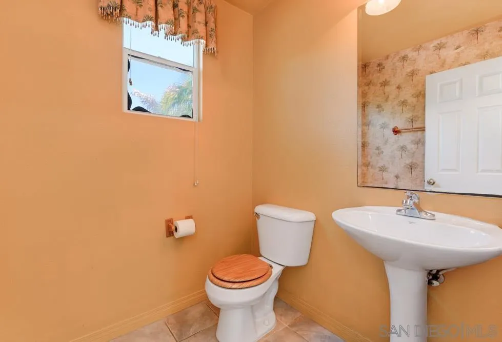 344 Natalie Way Fallbrook, CA 92028 - Photo 15 of 37 a bathroom with a sink and a toilet