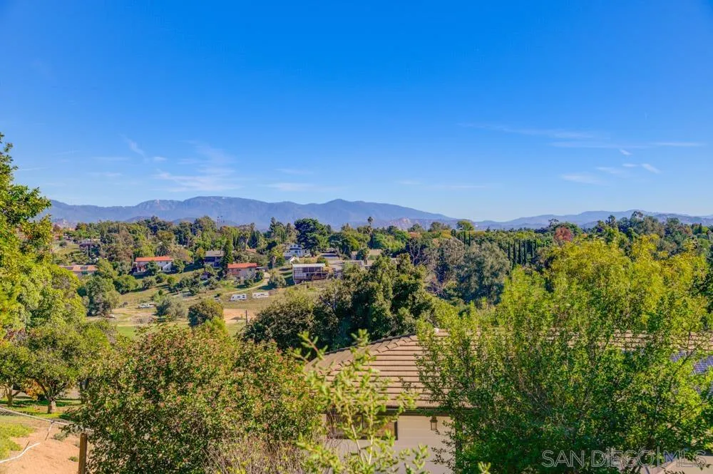 344 Natalie Way Fallbrook, CA 92028 - Photo 2 of 37 a view of a city with mountains in the background