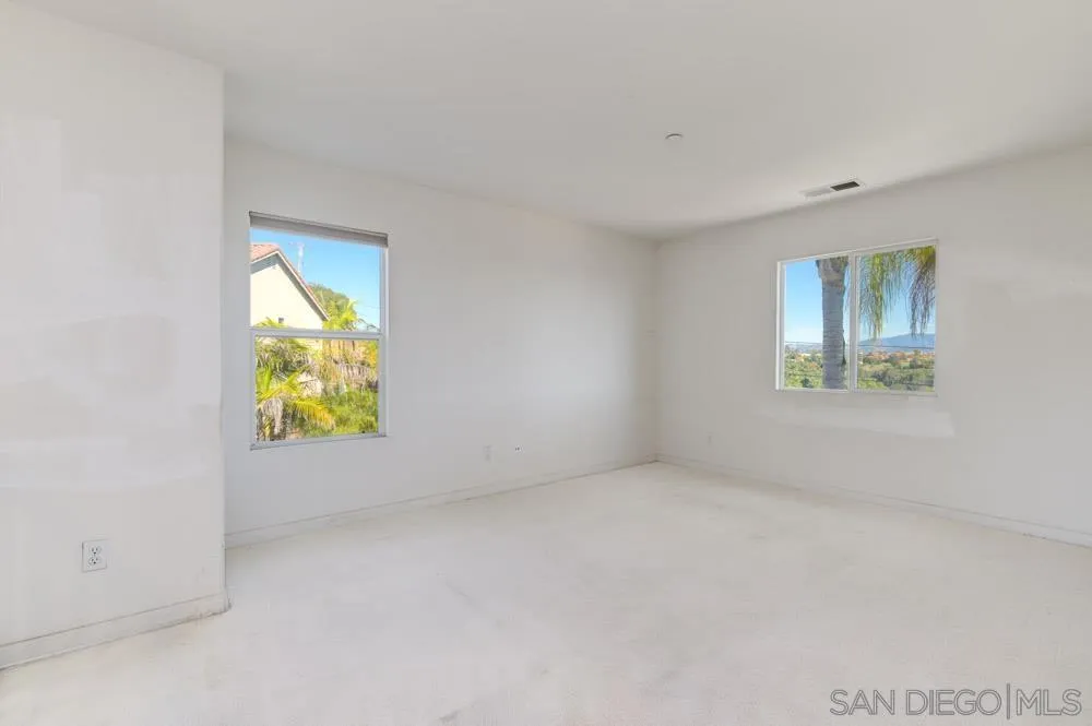 344 Natalie Way Fallbrook, CA 92028 - Photo 24 of 37 an empty room with windows