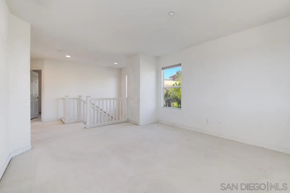 344 Natalie Way Fallbrook, CA 92028 - Photo 25 of 37 an empty room with windows and entrance