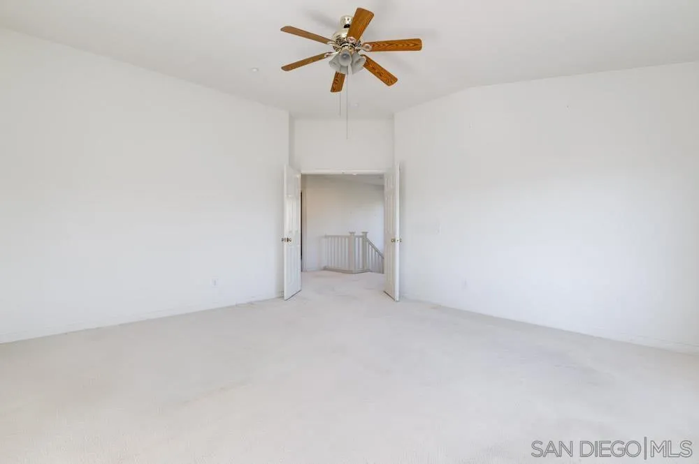 344 Natalie Way Fallbrook, CA 92028 - Photo 28 of 37 a view of a room with a ceiling fan and a window