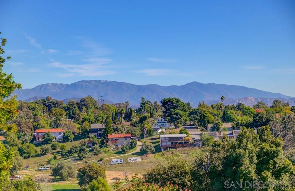 344 Natalie Way Fallbrook, CA 92028 - Photo 3 of 37 a view of a lush green hillside and houses