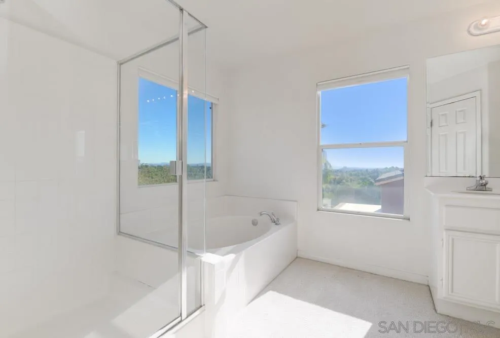 344 Natalie Way Fallbrook, CA 92028 - Photo 31 of 37 a bathroom with a bathtub and a shower