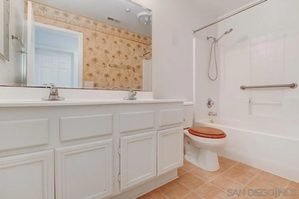 344 Natalie Way Fallbrook, CA 92028 - Photo 34 of 37 a bathroom with a sink a toilet and shower
