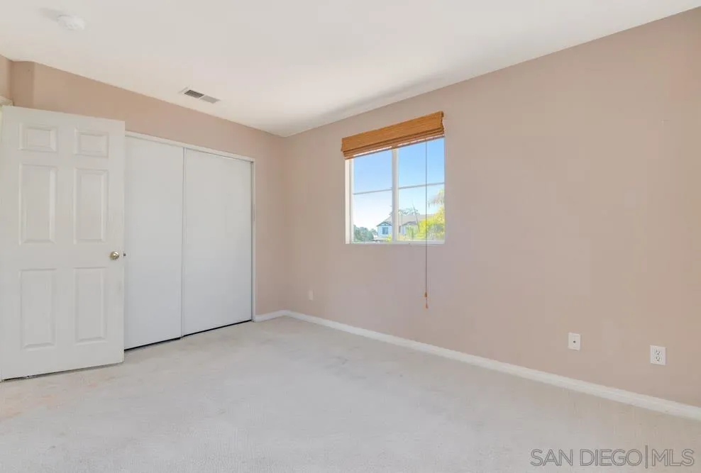 344 Natalie Way Fallbrook, CA 92028 - Photo 35 of 37 an empty room with windows