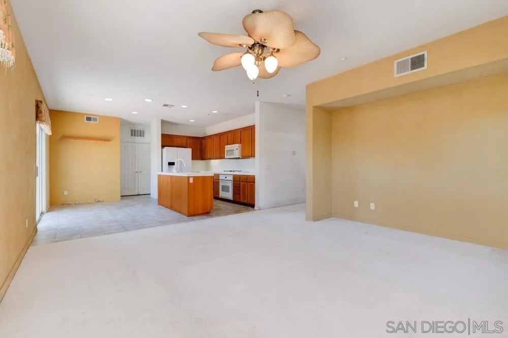 344 Natalie Way Fallbrook, CA 92028 - Photo 10 of 37 a view of a kitchen with a sink and a chandelier
